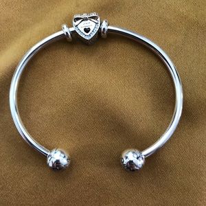 Pandora open bangle with just married charm.